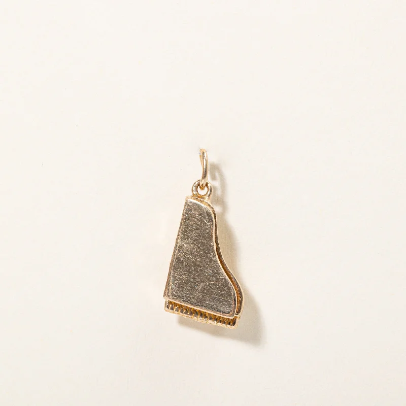 oval blue sapphire ring 14k Yellow Gold Grand Piano Charm
