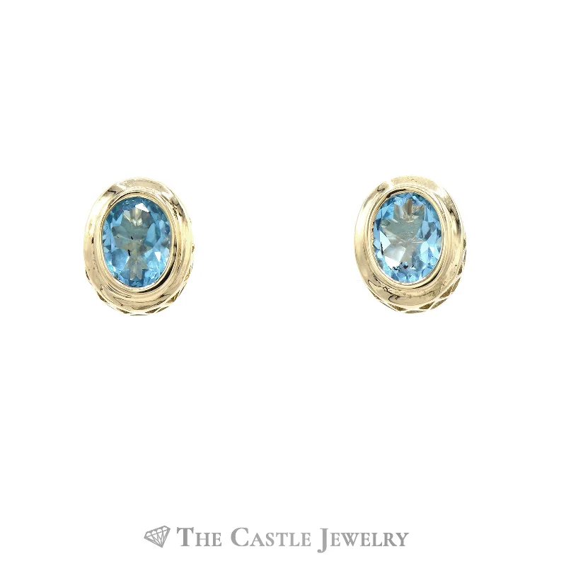 hammered gold signet ring Oval Bezel Set Blue Topaz Earrings in 14k Yellow Gold
