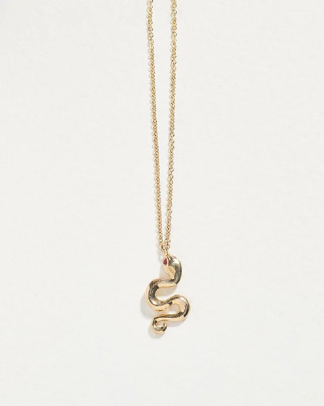 celestial sunburst necklace gold Serpent Ruby Pendant